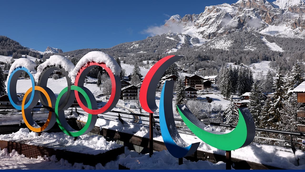 olympic-rings-snowy-alpine-mountain-village