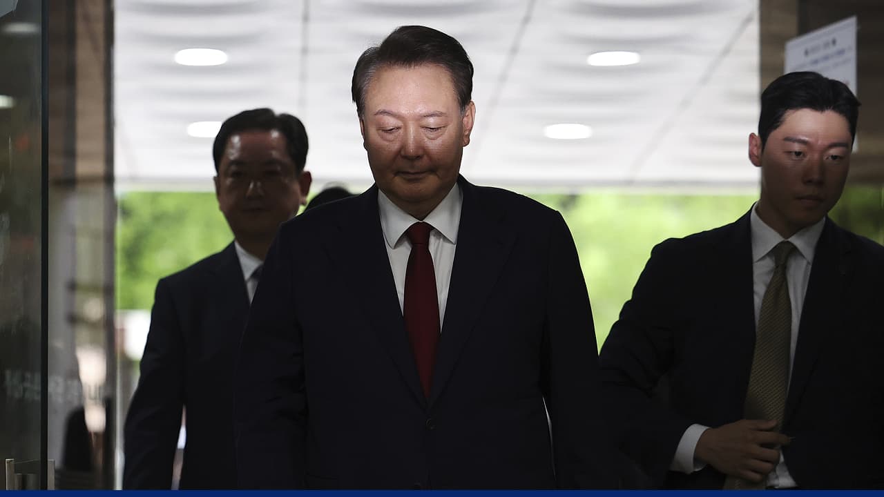 Former South Korean president escorted after rebellion conviction ruling